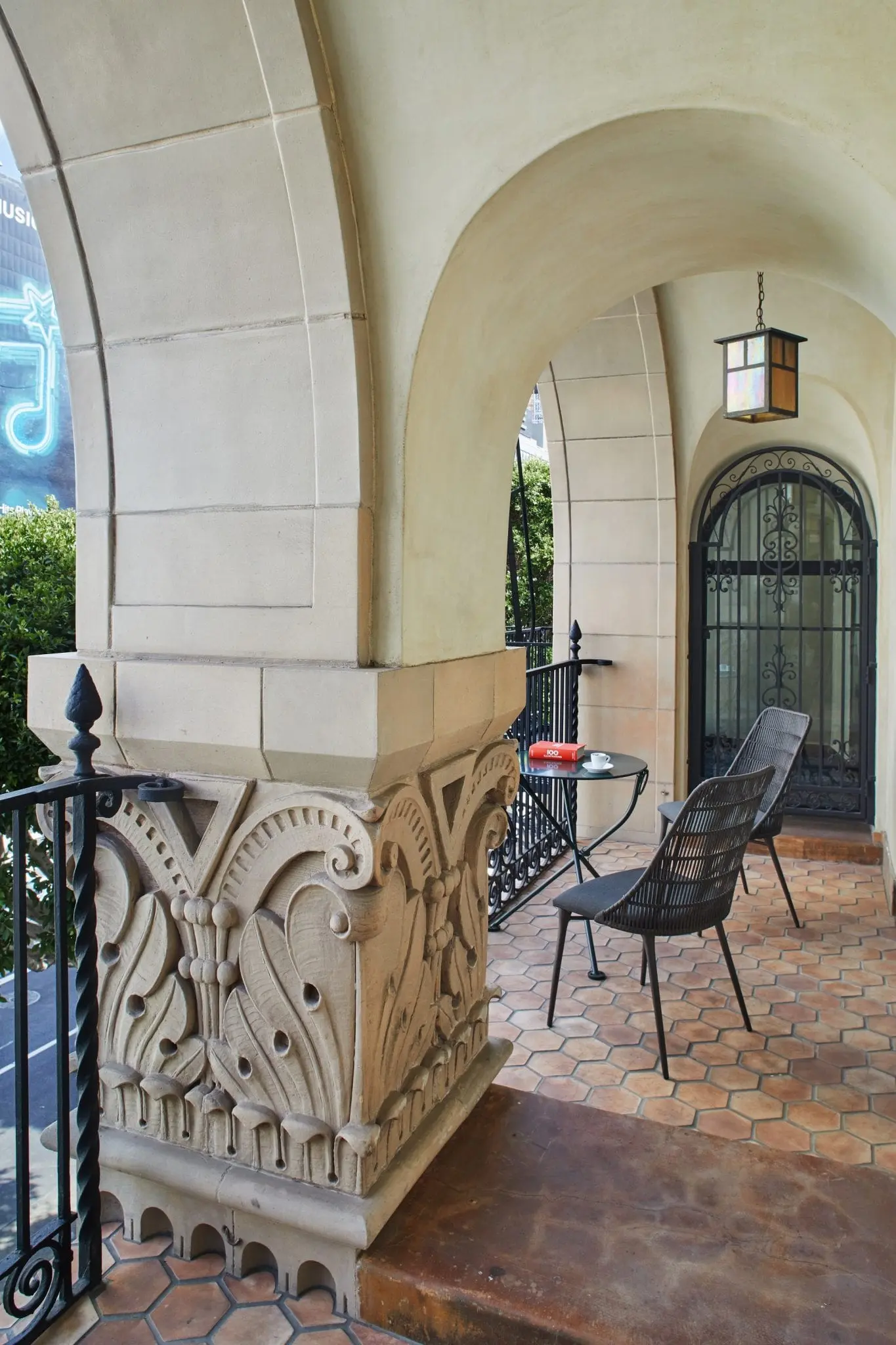 exterior hallway with patio furniture