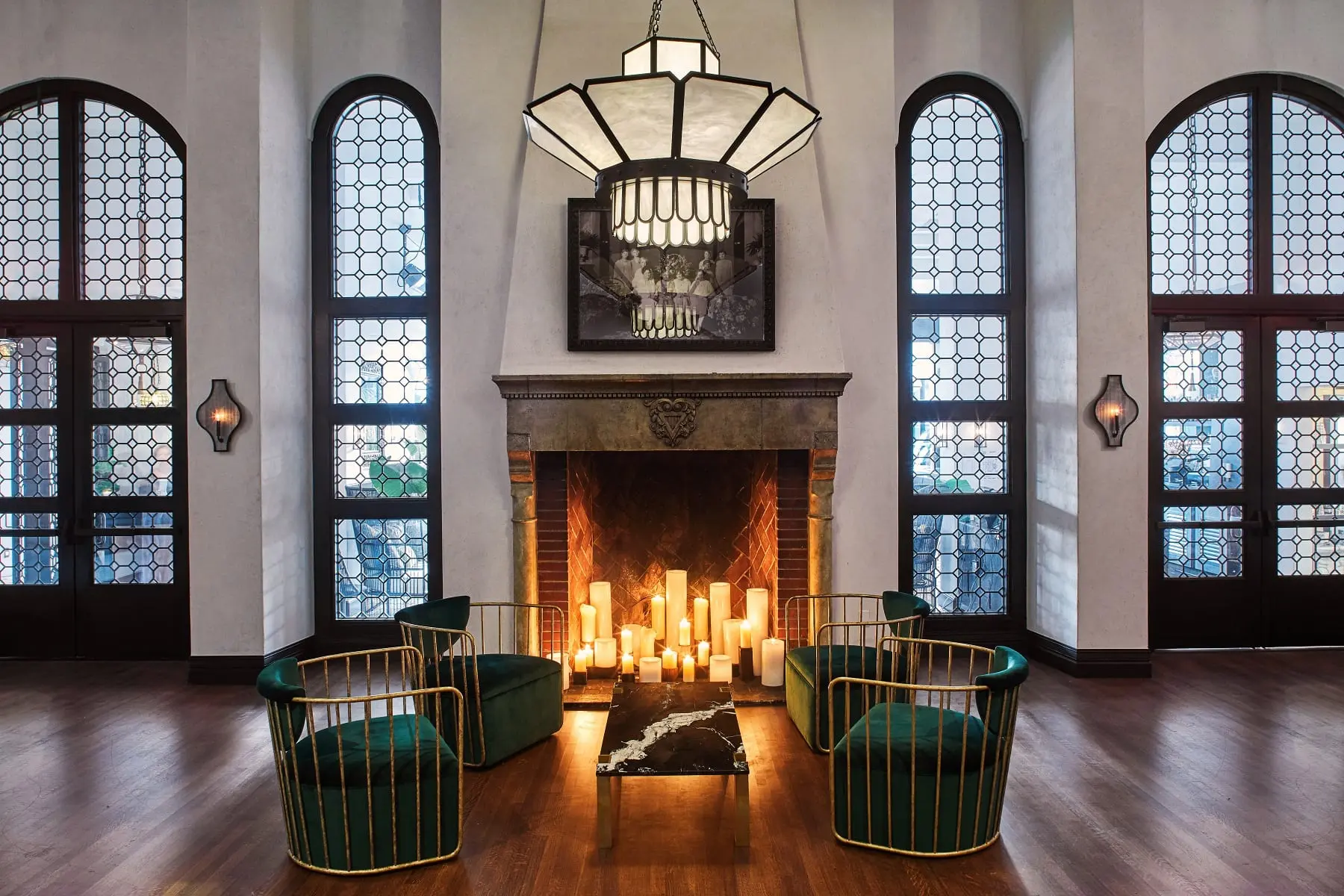 a living room filled with furniture and a fireplace