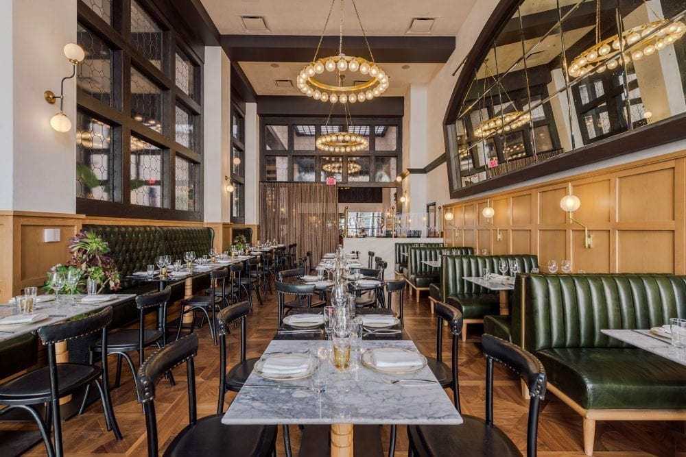 restaurant with tables, chairs, and booths