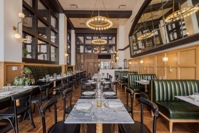 restaurant with tables, chairs, and booths