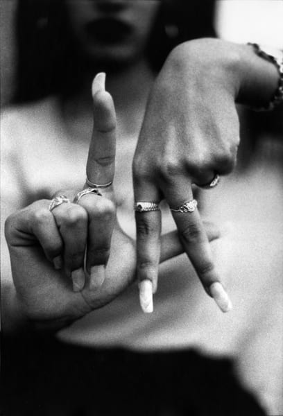 woman making sign of letters 