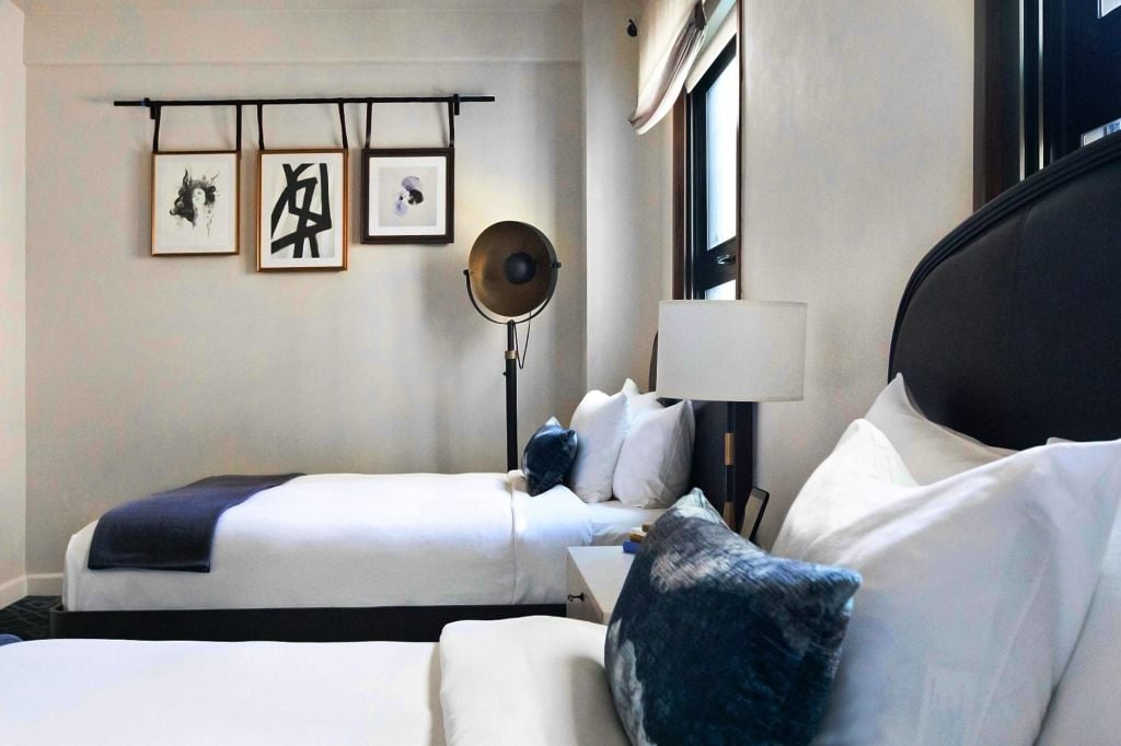 Double bed room with pillow and lamp