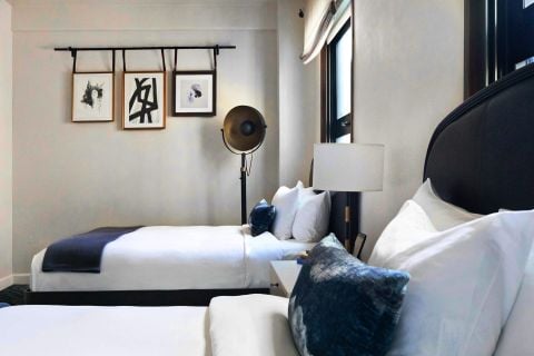 Double bed room with pillow and lamp