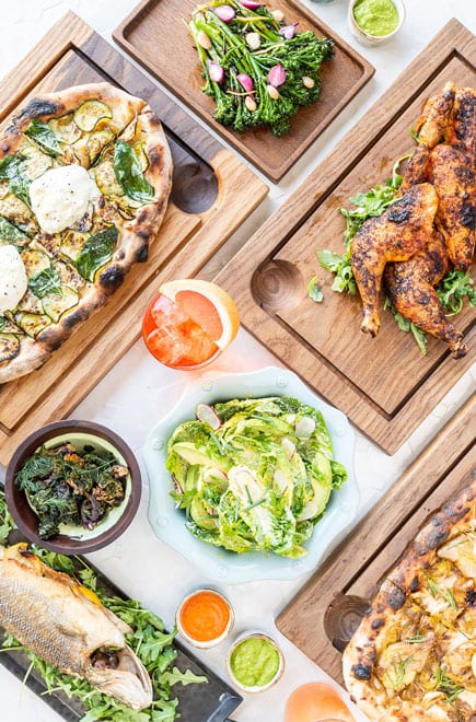 overhead view of cutting board with various dishes