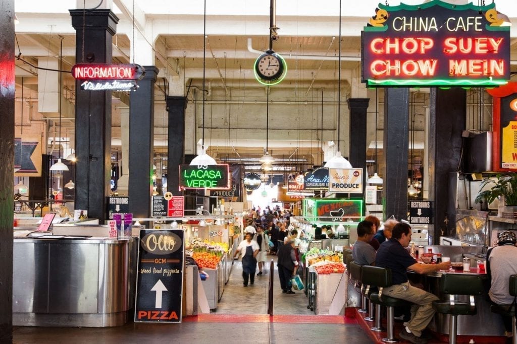 grand central market interior and people sitting at counter and walking